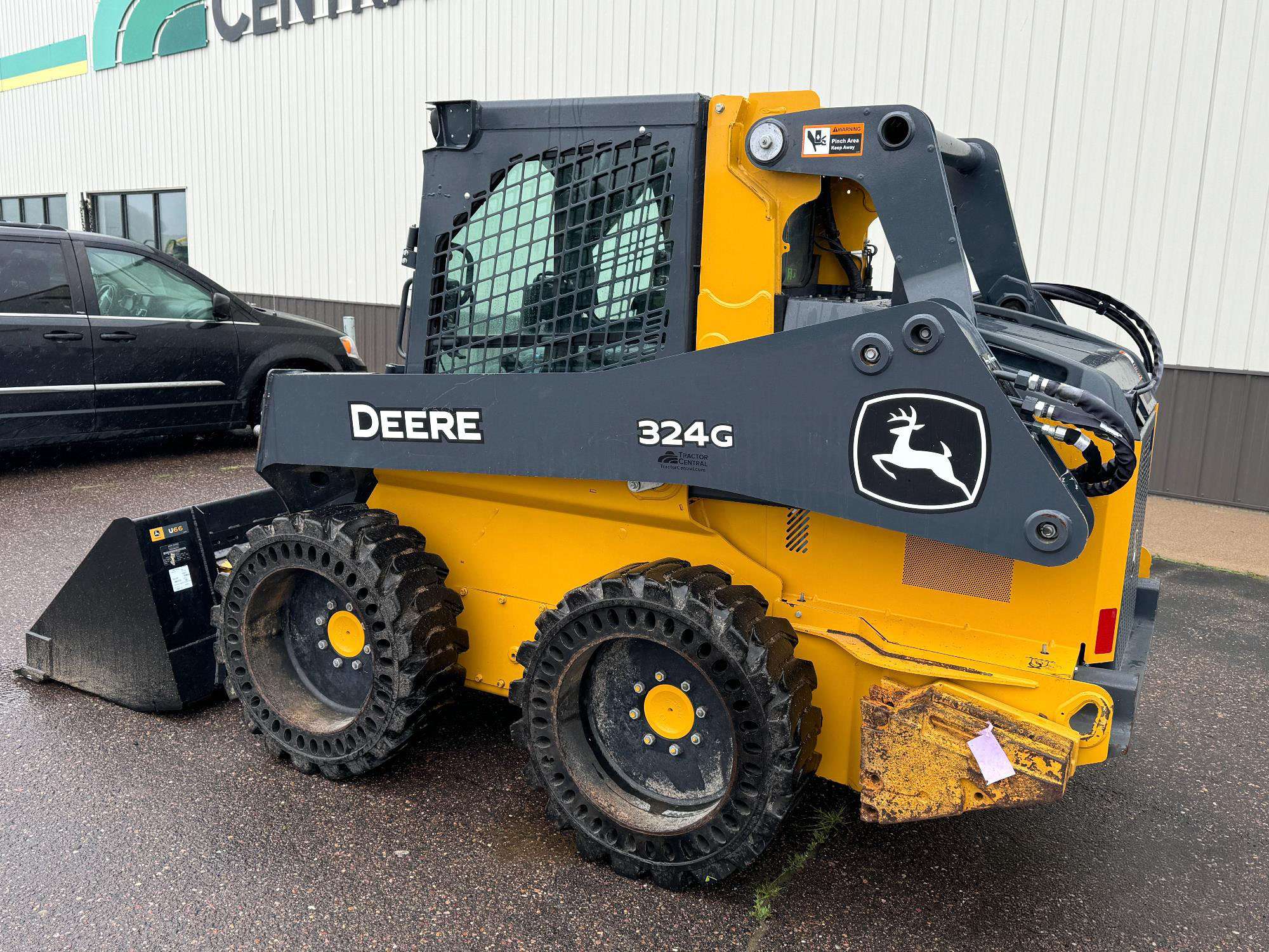 
								2022 John Deere 324G W/Bucket full									