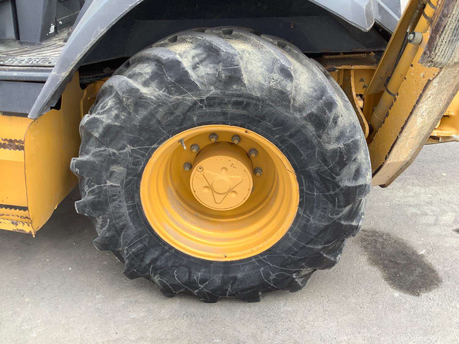 
								2015 John Deere 310L EP 4×4 full									